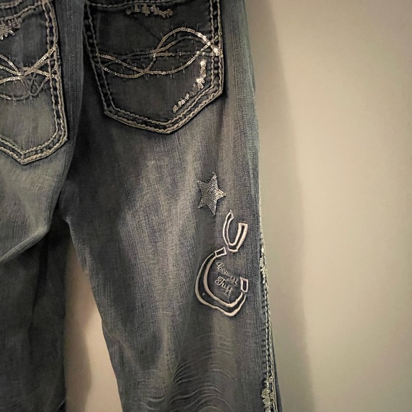 Blue Jeans with Decorative Embellishments and Contrast Stitching - Picture 4 of 10